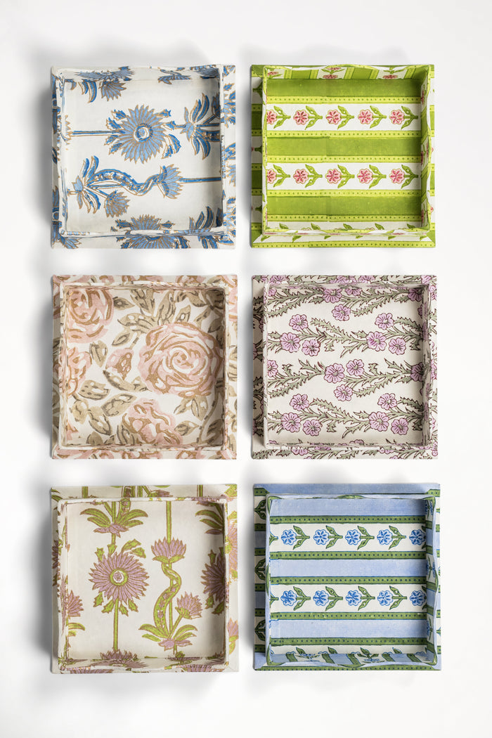 Forget-Me-Not Purple Blockprint Scalloped Decorative Trays — Purple tray displayed with separately sold patterned trays; Inner Child