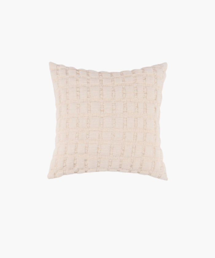 Square cream sham with a puffed grid texture and stitched detail, styled against a white backdrop.