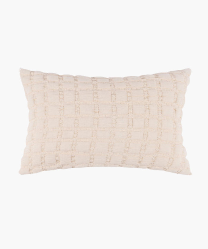 Rectangular cream sham with a puffed grid texture and stitched detail, styled against a white backdrop.