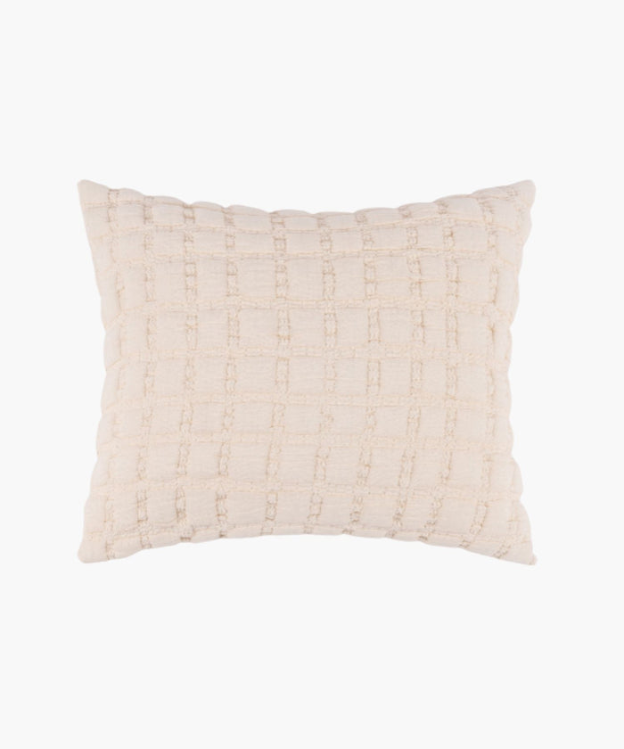 Rectangular cream sham with a puffed grid texture and stitched detail, styled against a white backdrop.