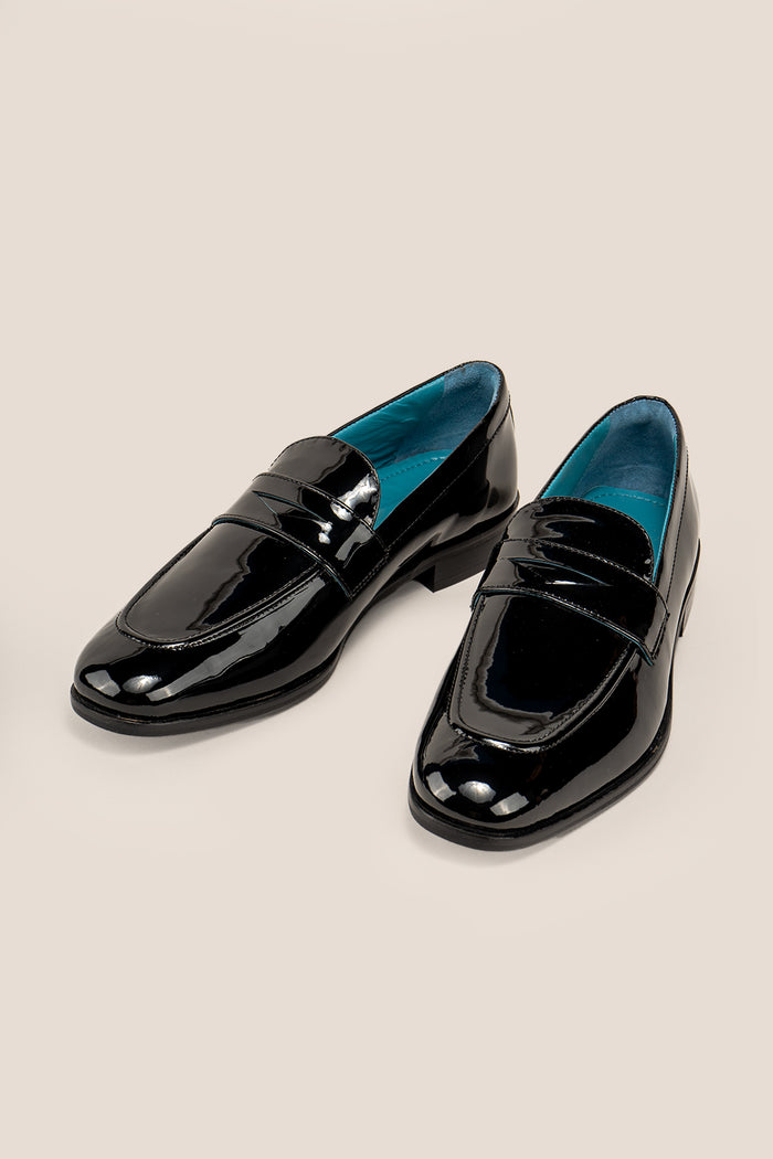 Dayton black saddle leather loafers for men, crafted from premium leather with classic saddle design, ideal for smart casual and formal occasions.