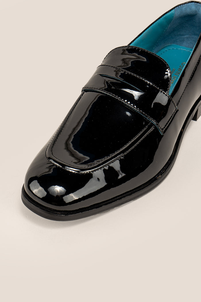 Dayton black saddle leather loafers for men, crafted from premium leather with classic saddle design, ideal for smart casual and formal occasions.