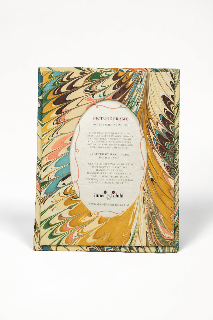 Flatiron Feathers Marbled Picture Frame with Oval Opening for 4 x 6 Photos — front view of the marbled frame and sample insert; Inner Child