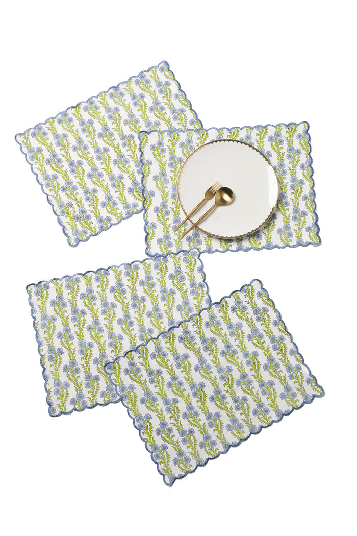 Forget-Me-Not Scalloped Cotton Placemat — Forget-Me-Not placemats shown with separate plate and flatware; Inner Child