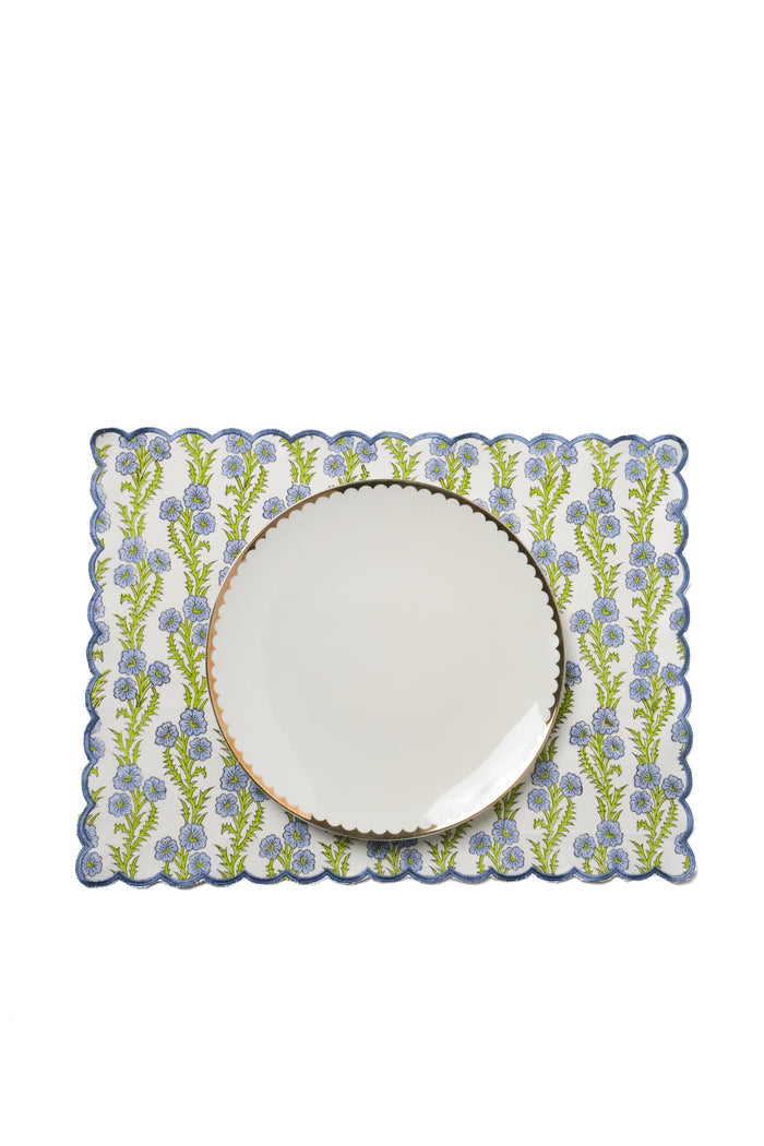 Forget-Me-Not Scalloped Cotton Placemat — placemat beneath a separate white plate; Inner Child