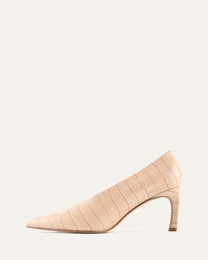 Beige high-heeled shoe on a white background