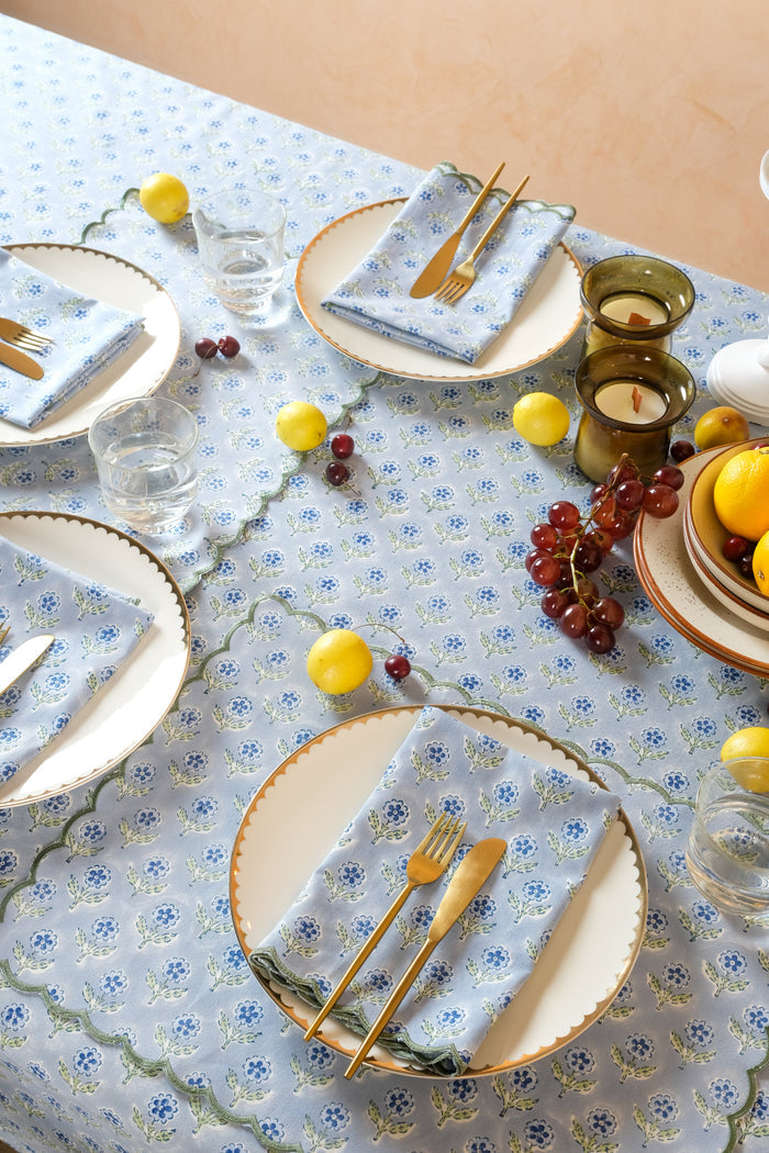 Mona Blue Scalloped Cotton Placemat — Mona mat at a setting with separate tableware; Inner Child
