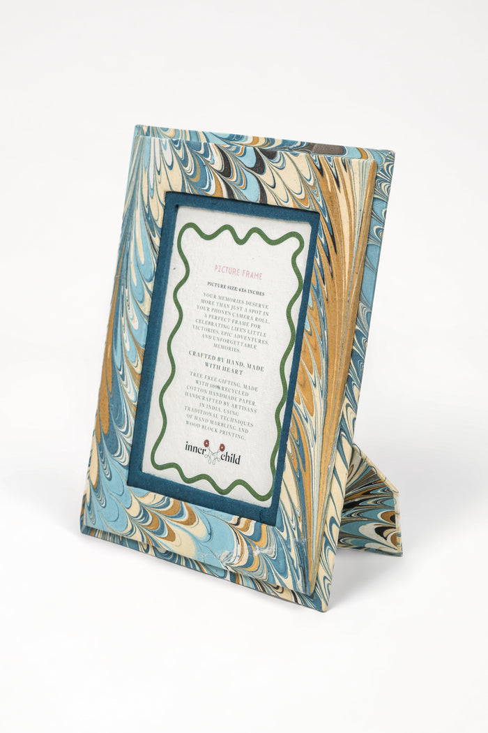 Nila Feathers Marbled Picture Frame for 4 x 6 Photos — Nila Feathers 4 x 6 photo frame standing on its support; Inner Child
