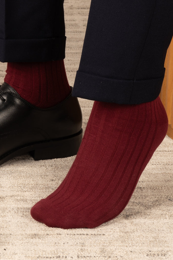 Oswin Hyde Groovy Six premium socks in bold reds, blues, and pinks, packaged in a sleek box for stylish gifting