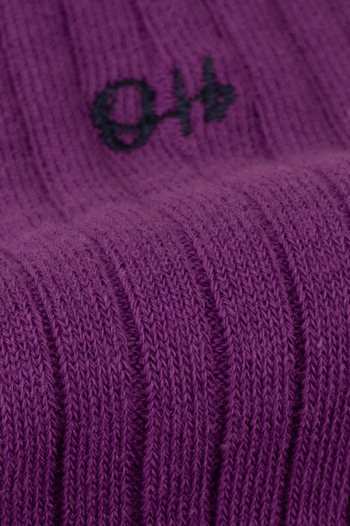 Oswin Hyde Groovy Six premium socks in bold reds, blues, and pinks, packaged in a sleek box for stylish gifting