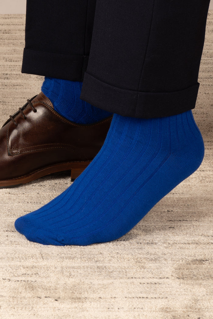 Oswin Hyde Groovy Six premium socks in bold reds, blues, and pinks, packaged in a sleek box for stylish gifting