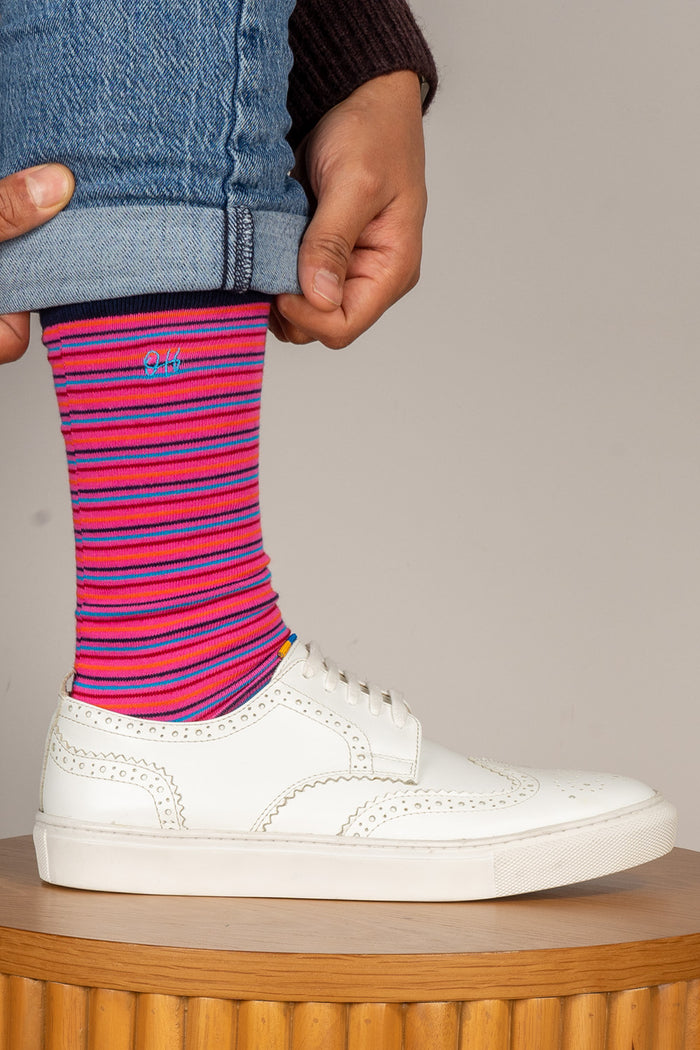 Oswin Hyde Warf three pairs of high-quality cotton socks for men, featuring unique prints and luxurious colours.