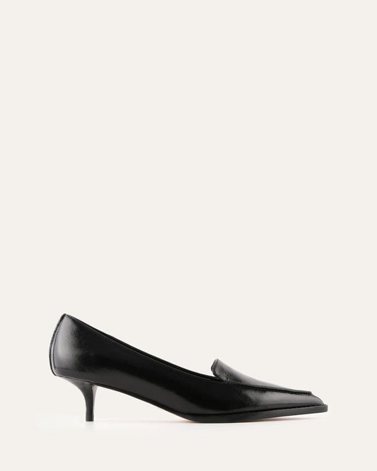 Black high-heeled shoes on a white background