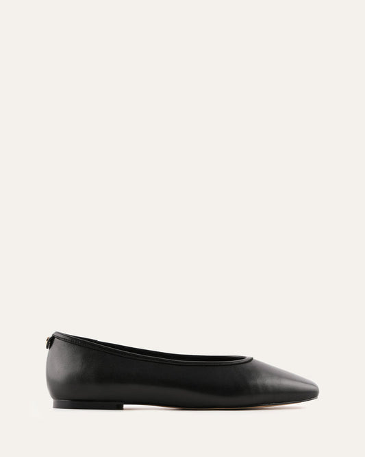 Black flat shoe on a white background