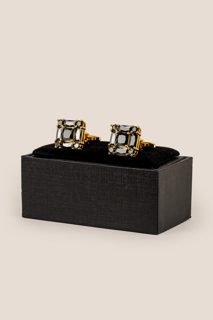 Men’s Zirc Onyx cufflinks featuring deep black onyx stones set in intricate metal detailing for formal elegance and luxury.